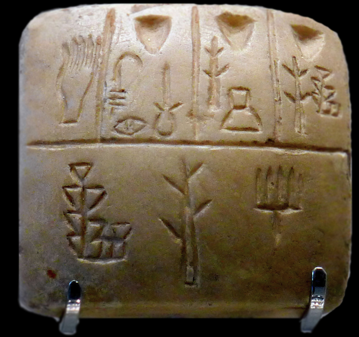 MÖ 3300–3000 Uruk Dönemi çivi yazısı Tapınak / depo muhasebe kaydı. Ekonomik kayıt belgesidir.